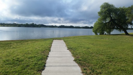 Sidewalk leading to lake